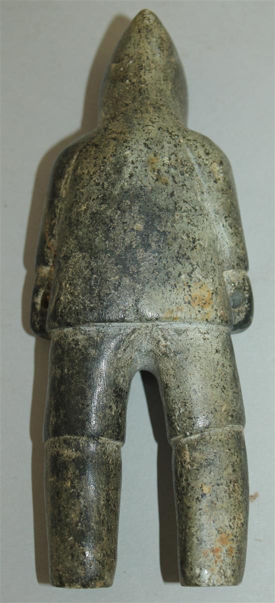 An Inuit carved soapstone figure of a male standing, 5.25in.